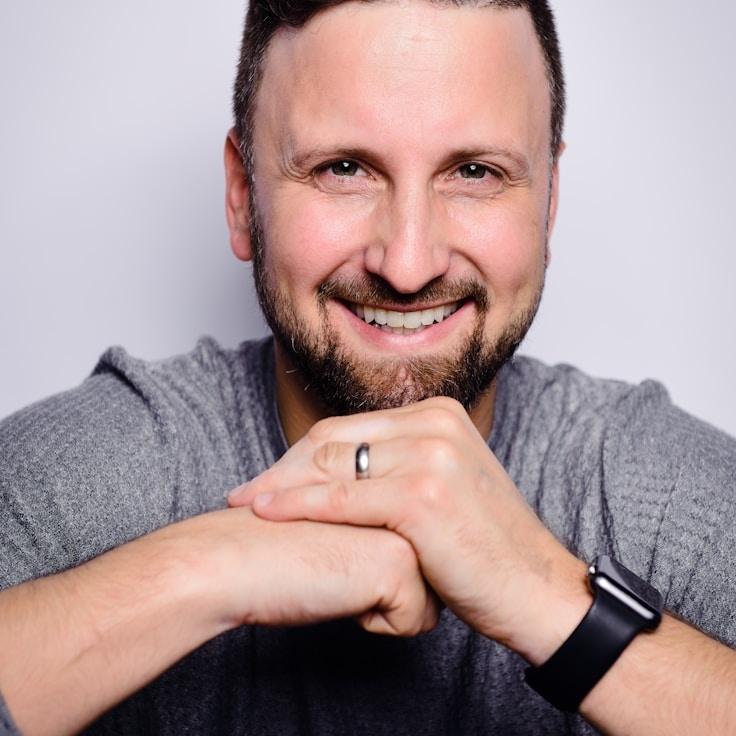 Jordan Sato, Client Relations Director, discussing corporate gifting strategy with business clients